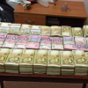 ​На Харьковщине у поселкового головы при обыске нашли $200 тысяч