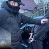 «Вибивали» 20 тисяч доларів США надуманого боргу – трьом мешканцям Київщини повідомлено про підозру