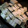 ​У столиці СБУ затримала групу фальшивомонетників: збували майже чверть мільйона доларів США. ВІДЕО