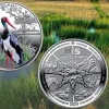 Національний банк України випустив нову ювілейну монету "Лелека чорний", що стала четвертою у серії, присвяченій відродженню дикої природи у Чорнобильському заповіднику